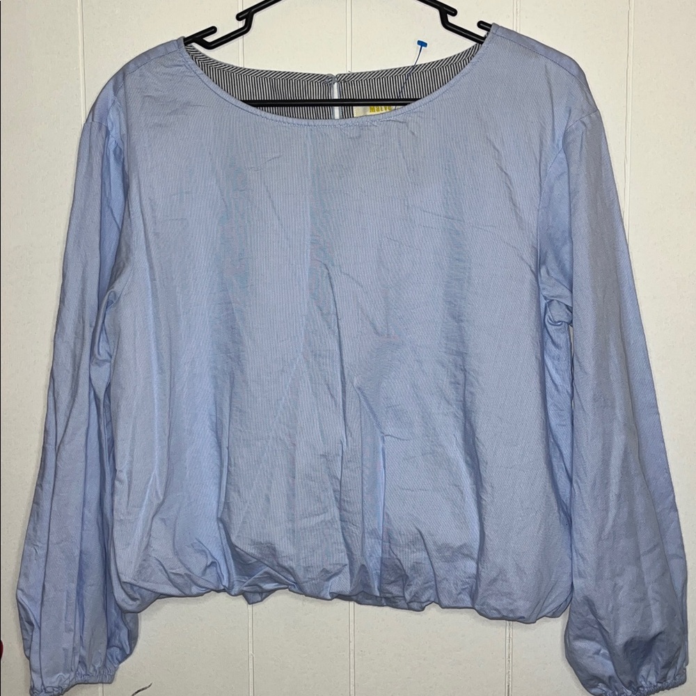 Maeve light blue long-sleeved blouse with a smocked hem PTP 22